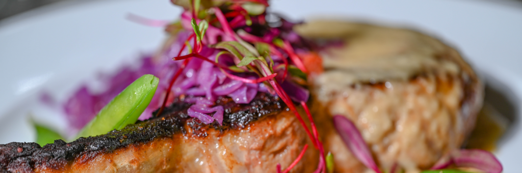 Enjoy authentic French cuisine at Brasserie du Monde - braised pork chop