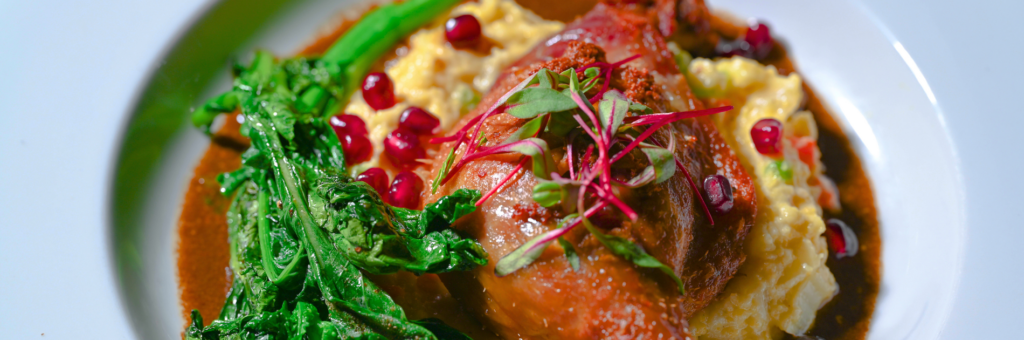 Enjoy authentic French cuisine at Brasserie du Monde - duck confit